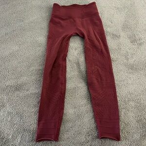 Free People Movement burgundy leggings.